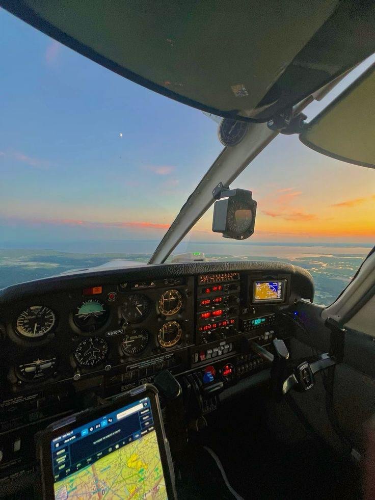 View from the cockpit of a Pelican Flight School airplane to the ground below